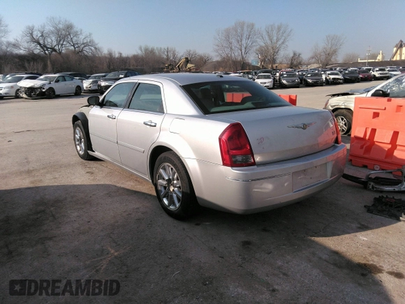 2007 Chrysler 300 Touring with VIN 2C3LA53G57H785979, listed as a IAAI auction lot 36241614 with 220,841 mi miles. Bid and sale history available at carsss.com. Image 3.