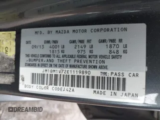 2014 Mazda 3 i Touring with VIN JM1BM1V72E1119890, listed as a IAAI auction lot 42531252 with 124,398 mi miles and . Bid and sale history available at DreamBid. Image 9.