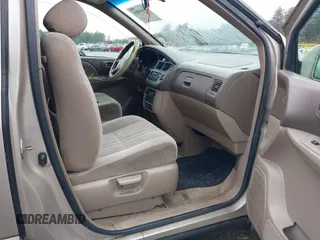 2003 Toyota Sienna LE with VIN 4T3ZF13C93U534860, listed as a IAAI auction lot 41800054 with 214,414 mi miles. Bid and sale history available at carsss.com. Image 5.