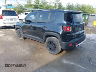 2018 Jeep Renegade Trailhawk with VIN ZACCJBCB4JPH13742, listed as a IAAI auction lot 42452388 with 60,897 mi miles and . Bid and sale history available at DreamBid. Image 3.