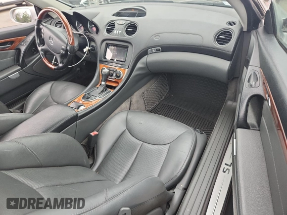 2005 Mercedes-Benz SL 500 with VIN WDBSK75F65F093215, listed as a Copart auction lot 63744135 with 94,645 mi miles and Salvage title. Bid and sale history available at DreamBid. Image 8.