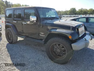 2008 Jeep Wrangler Unlimited Sahara with VIN 1J4GB59138L506461, listed as a Copart auction lot 75082664 with 178,944 mi miles and Salvage title. Bid and sale history available at DreamBid. Image 4.