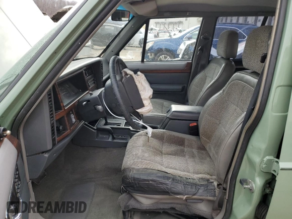1996 Jeep Cherokee Country with VIN 1J4FJ78S3TL180304, listed as a Copart auction lot 45291925 with 162,876 mi miles and Salvage Title. Bid and sale history available at carsss.com. Image 7.