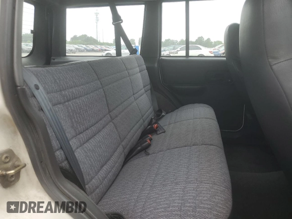 1999 Jeep Cherokee SE with VIN 1J4FF28S3XL672857, listed as a Copart auction lot 62032845 with 192,486 mi miles and Clean title. Bid and sale history available at DreamBid. Image 10.