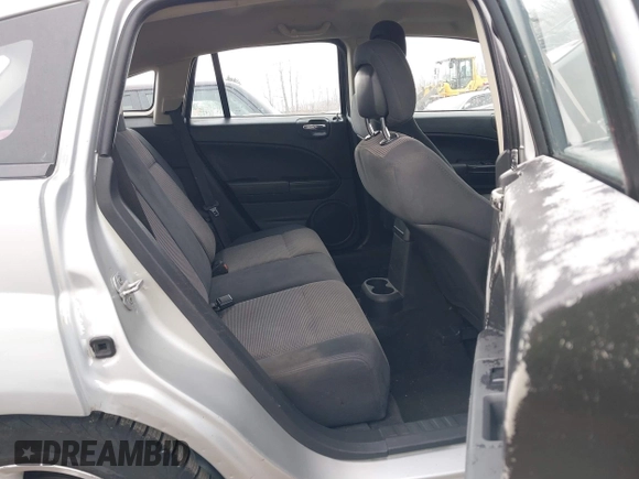 2011 Dodge Caliber Mainstreet with VIN 1B3CB3HA2BD238032, listed as a IAAI auction lot 41865918 with 98,022 mi miles and . Bid and sale history available at DreamBid. Image 8.