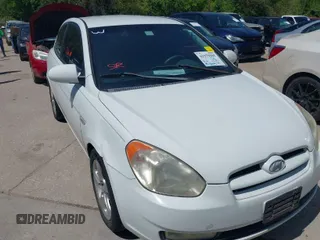 2007 Hyundai Accent SE with VIN KMHCN36C47U009459, listed as a IAAI auction lot 41979395 with 202,844 mi miles. Bid and sale history available at carsss.com. Image 1.