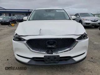 2020 Mazda CX-5 Touring z VIN JM3KFBCM8L1789067, wystawiony jako Copart lot #54953015 z przebiegiem 134 306 mil mil oraz Nie do naprawy • Non repairable. Historia ofert i sprzedaży dostępna na DreamBid. Obrazek 5.