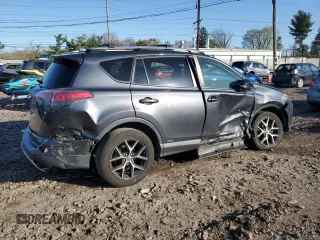 2018 Toyota RAV4 Hybrid SE with VIN JTMJJREV5JD210274, listed as a Copart auction lot 52450645 with 108,249 mi miles and Salvage title. Bid and sale history available at DreamBid. Image 3.