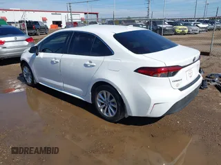 2024 Toyota Corolla Hybrid LE with VIN JTDBCMFEXR3055271, listed as a IAAI auction lot 41396359 with 8,654 mi miles. Bid and sale history available at carsss.com. Image 3.