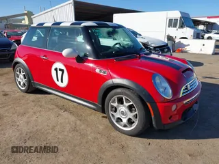 2006 MINI Hardtop S with VIN WMWRE33586TJ35569, listed as a IAAI auction lot 41659299 with 98,737 mi miles and . Bid and sale history available at DreamBid. Image 1.