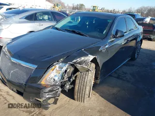 2012 Cadillac CTS Performance with VIN 1G6DJ5E37C0108606, listed as a IAAI auction lot 41497567 with 138,597 mi miles and . Bid and sale history available at DreamBid. Image 2.