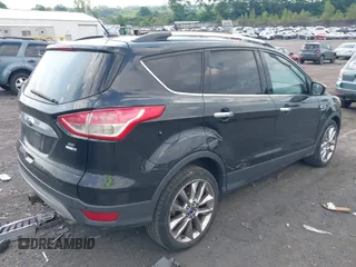 2014 Ford Escape SE with VIN 1FMCU9G94EUD84466, listed as a IAAI auction lot 42645080 with 135,535 mi miles and . Bid and sale history available at DreamBid. Image 4.