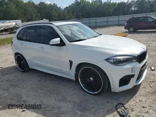 2016 BMW X5 M z VIN 5YMKT6C52G0R79404, wystawiony jako Copart lot #54587105 z przebiegiem 89 465 mil mil oraz Szkoda całkowita • Salvage title. Historia ofert i sprzedaży dostępna na DreamBid. Obrazek 4.