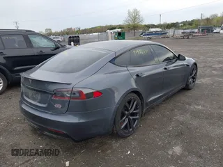 2021 Tesla Model S Long Range with VIN 5YJSA1E5XMF428519, listed as a IAAI auction lot 41926242 with 54,284 mi miles and . Bid and sale history available at DreamBid. Image 4.