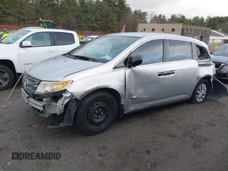 2011 Honda Odyssey LX with VIN 5FNRL5H29BB010256, listed as a IAAI auction lot 40931367 with Not provided miles and . Bid and sale history available at DreamBid. Image 14.