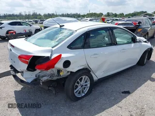 2018 Ford Focus SE with VIN 1FADP3F29JL213008, listed as a IAAI auction lot 41790224 with 85,056 mi miles and . Bid and sale history available at DreamBid. Image 4.