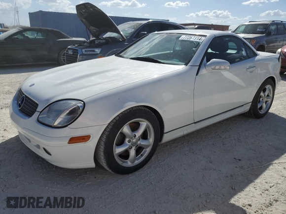 2001 Mercedes-Benz SLK-Class with VIN WDBKK65F71F218677, listed as a Copart auction lot 77267814 with Not Provided miles and Salvage Title. Bid and sale history available at carsss.com. Image 1.