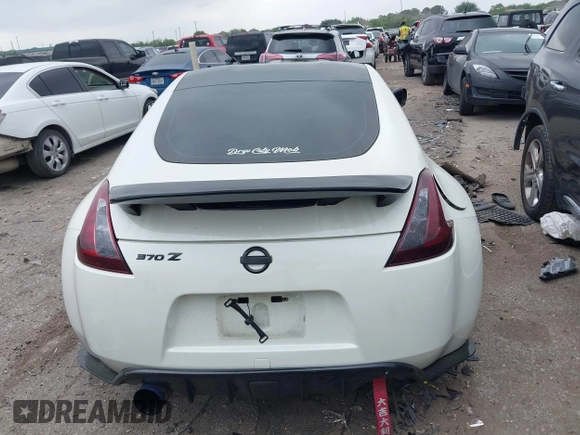 2016 Nissan 370Z Sport z VIN JN1AZ4EH1GM930883, wystawiony jako IAAI lot #41909945 z przebiegiem 80 484 mil mil oraz . Historia ofert i sprzedaży dostępna na DreamBid. Obrazek 17.