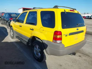 2001 Ford Escape XLS with VIN 1FMYU02191KF55561, listed as a IAAI auction lot 41650852 with 234,247 mi miles. Bid and sale history available at carsss.com. Image 3.