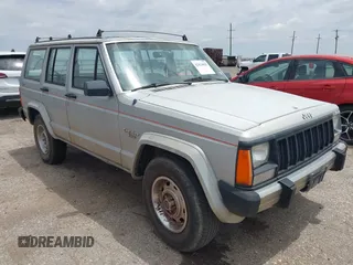 1984 Jeep Cherokee z VIN 1JCWC7822ET121990, wystawiony jako IAAI lot #42424825 z przebiegiem 190 810 mil mil oraz . Historia ofert i sprzedaży dostępna na DreamBid. Obrazek 1.