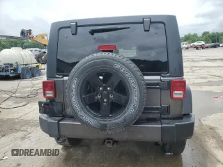 2016 Jeep Wrangler Unlimited Sport with VIN 1C4BJWDG1GL165418, listed as a Copart auction lot 61364095 with 123,772 mi miles and Salvage title. Bid and sale history available at DreamBid. Image 6.