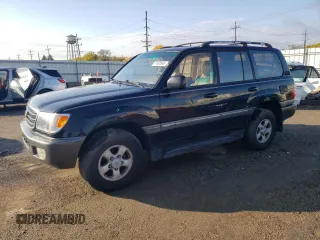 1999 Toyota Land Cruiser with VIN JT3HT05J5X0072564, listed as a Copart auction lot 77000044 with 312,428 mi miles and Salvage Title. Bid and sale history available at carsss.com. Image 1.