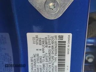 2023 Honda Civic Sedan Touring with VIN 2HGFE1F94PH306598, listed as a Copart auction lot 48559185 with 15,264 mi miles and Salvage Title. Bid and sale history available at carsss.com. Image 12.