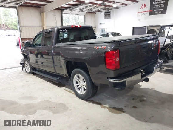 2016 Chevrolet Silverado 1500 LT with VIN 1GCVKREH3GZ137734, listed as a IAAI auction lot 41975379 with 108,704 mi miles and . Bid and sale history available at DreamBid. Image 3.