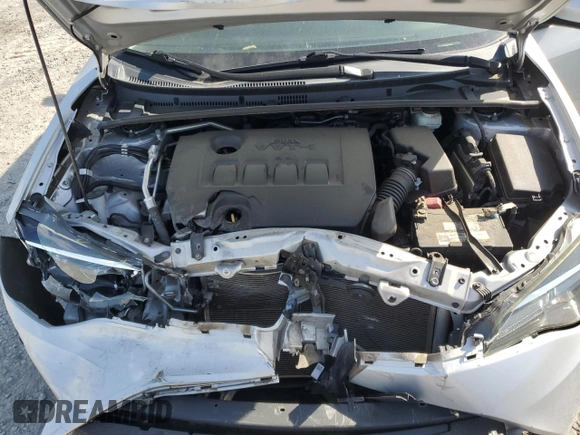2019 Toyota Corolla L z VIN 2T1BURHE5KC219319, wystawiony jako Copart lot #54297135 z przebiegiem 68 876 mil mil oraz Szkoda całkowita • Salvage title. Historia ofert i sprzedaży dostępna na DreamBid. Obrazek 11.