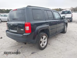 2014 Jeep Patriot Latitude with VIN 1C4NJRFB3ED551622, listed as a IAAI auction lot 40917179 with 109,856 mi miles. Bid and sale history available at carsss.com. Image 4.