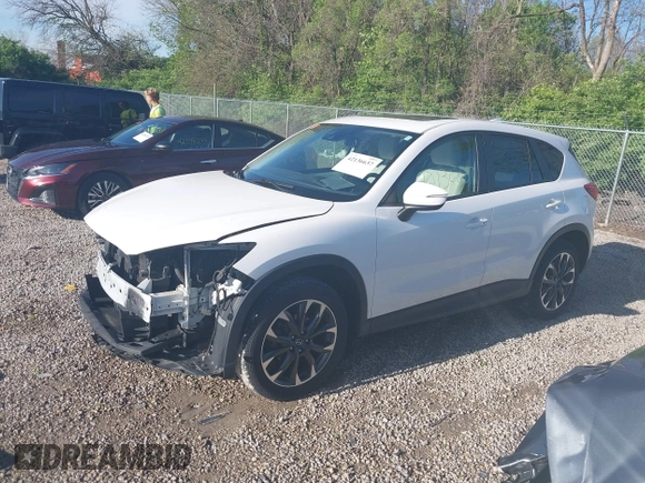 2016 Mazda CX-5 Grand Touring with VIN JM3KE4DY1G0680431, listed as a IAAI auction lot 42136637 with 166,348 mi miles. Bid and sale history available at carsss.com. Image 15.