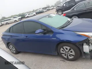 2018 Toyota Prius Two with VIN JTDKARFU4J3064739, listed as a IAAI auction lot 41918080 with 103,664 mi miles. Bid and sale history available at carsss.com. Image 14.