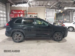 2016 Jeep Cherokee Latitude with VIN 1C4PJMCB5GW289738, listed as a IAAI auction lot 41472536 with 175,292 mi miles. Bid and sale history available at carsss.com. Image 14.