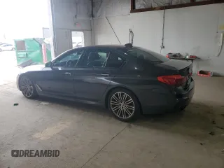 2018 BMW 5 Series M550i xDrive with VIN WBAJB9C58JB035267, listed as a Copart auction lot 64616605 with 125,365 mi miles and Clean title. Bid and sale history available at DreamBid. Image 2.