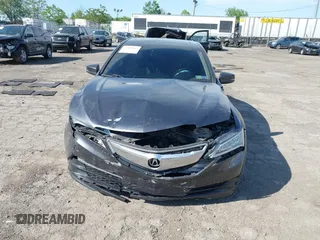2015 Acura TLX with VIN 19UUB1F34FA026219, listed as a IAAI auction lot 42240969 with 84,617 mi miles and . Bid and sale history available at DreamBid. Image 6.
