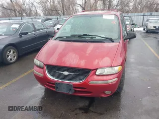 1999 Chrysler Town & Country with VIN 1C4GT64L7XB723937, listed as a IAAI auction lot 41609957 with 242,800 mi miles and . Bid and sale history available at DreamBid. Image 6.