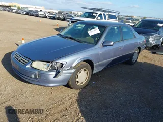 2000 Toyota Camry CE with VIN 4T1BG22K6YU000857, listed as a IAAI auction lot 42118645 with 244,448 mi miles and . Bid and sale history available at carsss.com. Image 2.