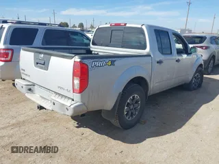2018 Nissan Frontier SV with VIN 1N6AD0EV0JN761092, listed as a IAAI auction lot 41502701 with 103,900 mi miles and . Bid and sale history available at DreamBid. Image 4.