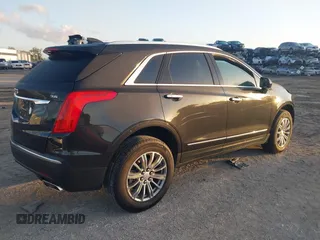 2019 Cadillac XT5 Luxury FWD with VIN 1GYKNCRS6KZ253400, listed as a IAAI auction lot 41984279 with 55,412 mi miles and . Bid and sale history available at DreamBid. Image 4.