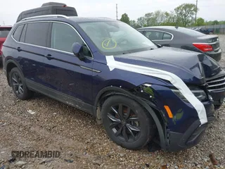 2022 Volkswagen Tiguan SE z VIN 3VV2B7AX8NM098143, wystawiony jako IAAI lot #42209345 z przebiegiem 32 891 mil mil oraz . Historia ofert i sprzedaży dostępna na DreamBid. Obrazek 1.