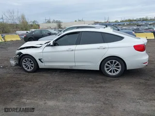 2014 BMW 3 Series Gran Turismo 328i xDrive with VIN WBA3X5C5XED559713, listed as a IAAI auction lot 42078622 with 68,233 mi miles. Bid and sale history available at carsss.com. Image 14.