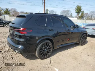 2024 BMW X5 xDrive50e z VIN 5UX43EU09R9U51760, wystawiony jako Copart lot #49055155 z przebiegiem 7199 mil mil oraz Szkody całkowita. Historia ofert i sprzedaży dostępna na DreamBid. Obrazek 3.