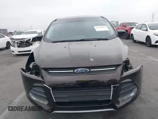 2013 Ford Escape SE with VIN 1FMCU0GX4DUA34229, listed as a IAAI auction lot 42358941 with 141,492 mi miles and . Bid and sale history available at DreamBid. Image 13.