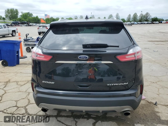 2020 Ford Edge Titanium с VIN 2FMPK3K93LBB56277, выставлен на аукционе Copart как лот 57502985 с пробегом 80 352 миль миль и Списание • Salvage title. История ставок и продаж доступна на DreamBid. Изображение 6.