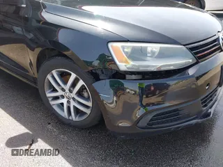 2011 Volkswagen Jetta Sedan SE w/Convenience & Sunroof with VIN 3VWDX7AJ5BM354817, listed as a IAAI auction lot 41919430 with 156,284 mi miles. Bid and sale history available at carsss.com. Image 6.
