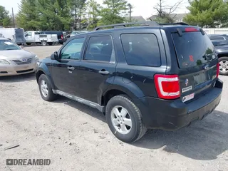 2009 Ford Escape XLT with VIN 1FMCU93GX9KC80750, listed as a IAAI auction lot 41953121 with 165,856 mi miles. Bid and sale history available at carsss.com. Image 3.