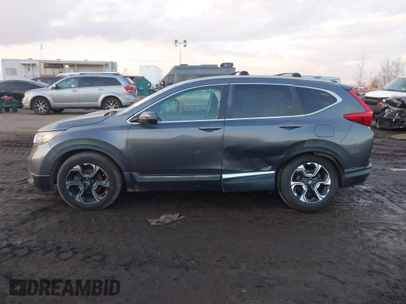 2017 Honda CR-V Touring with VIN 2HKRW2H94HH617081, listed as a IAAI auction lot 41294254 with 145,140 mi miles. Bid and sale history available at carsss.com. Image 14.