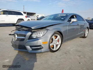 2014 Mercedes-Benz CLS-Class CLS 550 with VIN WDDLJ9BB9EA100098, listed as a Copart auction lot 88949975 with 89,764 mi miles and Salvage Title. Bid and sale history available at carsss.com. Image 1.