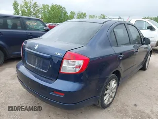 2009 Suzuki SX4 Sport FWD z VIN JS2YC414196200260, wystawiony jako IAAI lot #42354835 z przebiegiem 175 909 mil mil oraz . Historia ofert i sprzedaży dostępna na DreamBid. Obrazek 4.