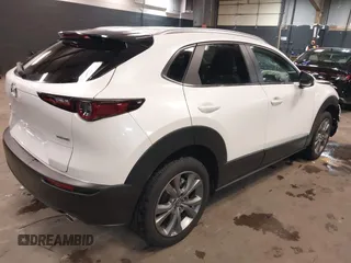 2024 Mazda CX-30 S Carbon Edition z VIN 3MVDMBCM4RM657165, wystawiony jako IAAI lot #42297738 z przebiegiem 7 041 mil mil oraz . Historia ofert i sprzedaży dostępna na DreamBid. Obrazek 4.